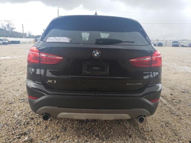 Photo 5 VIN: WBXHU7C5XK5L10396 - BMW X1 