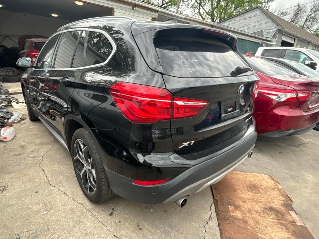 Photo 2 VIN: WBXHU7C5XK5N57000 - BMW X1 