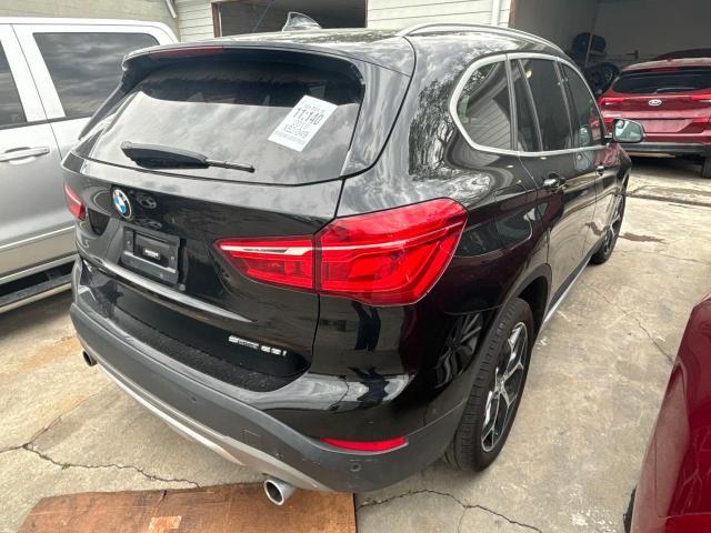 Photo 3 VIN: WBXHU7C5XK5N57000 - BMW X1 