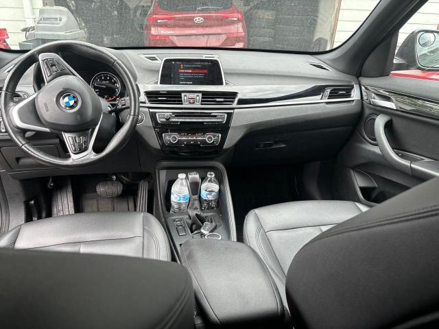 Photo 8 VIN: WBXHU7C5XK5N57000 - BMW X1 