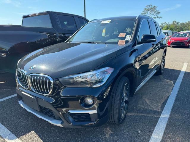 Photo 1 VIN: WBXHU7C5XK5N57000 - BMW X1 