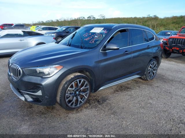 Photo 1 VIN: WBXJG7C00M5T74818 - BMW X1 