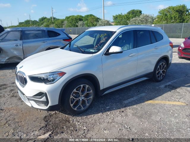 Photo 1 VIN: WBXJG7C00M5T75533 - BMW X1 