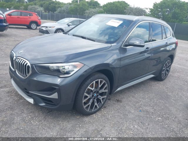 Photo 1 VIN: WBXJG7C01M5S15970 - BMW X1 