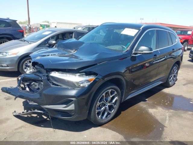 Photo 1 VIN: WBXJG7C01M5T21707 - BMW X1 