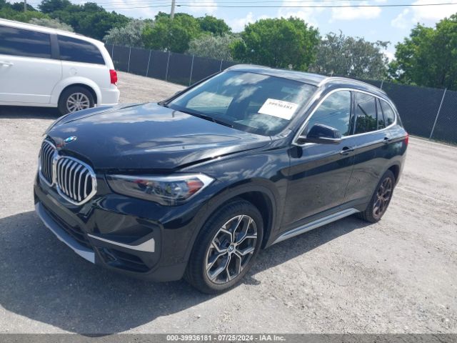 Photo 1 VIN: WBXJG7C02M5U00948 - BMW X1 