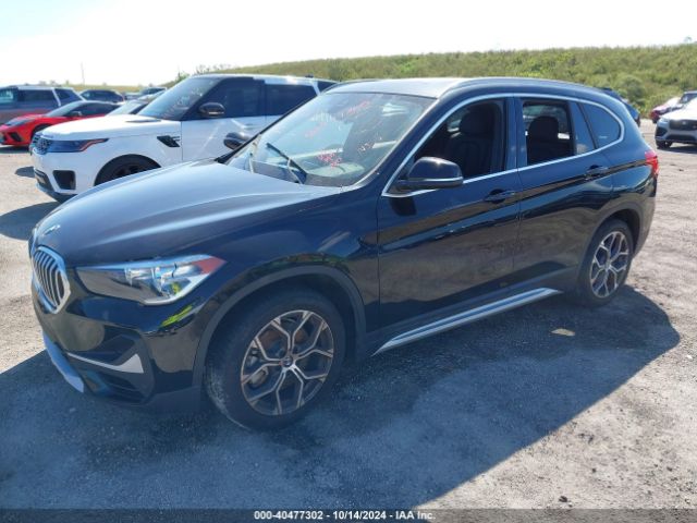 Photo 1 VIN: WBXJG7C03M3M78814 - BMW X1 