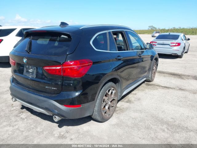 Photo 3 VIN: WBXJG7C03M3M78814 - BMW X1 