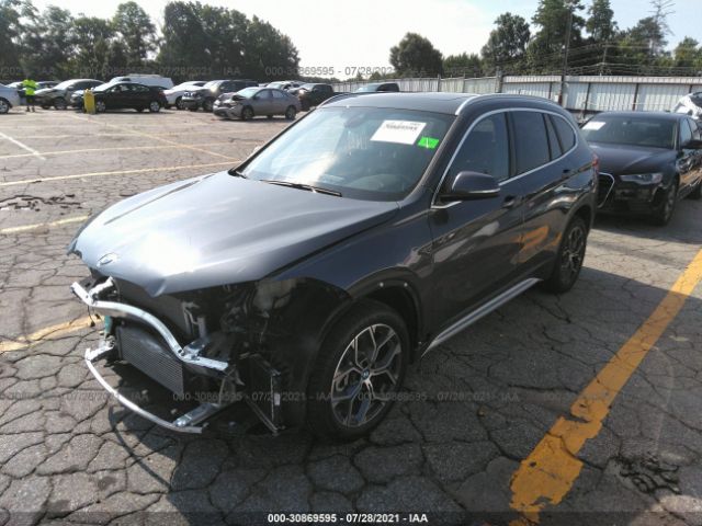 Photo 1 VIN: WBXJG7C03M5S68153 - BMW X1 