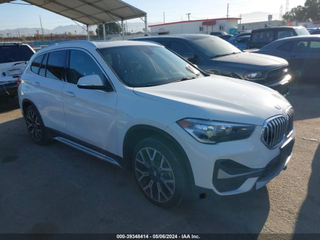 Photo 0 VIN: WBXJG7C04M5S61566 - BMW X1 