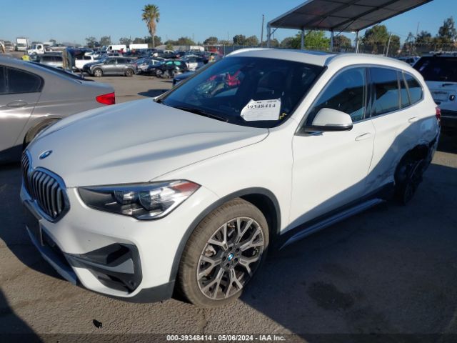 Photo 1 VIN: WBXJG7C04M5S61566 - BMW X1 