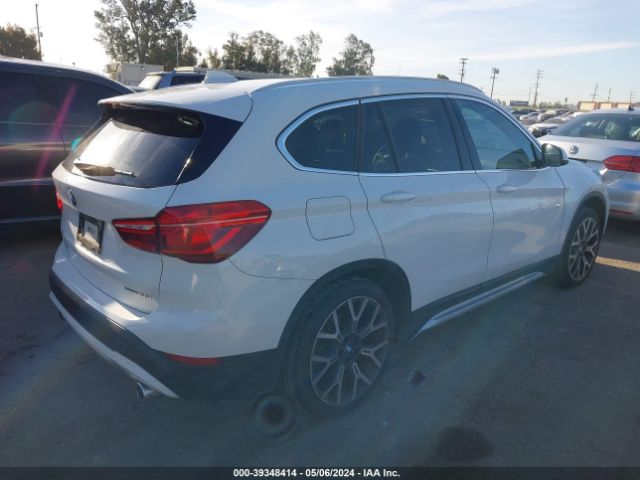 Photo 3 VIN: WBXJG7C04M5S61566 - BMW X1 