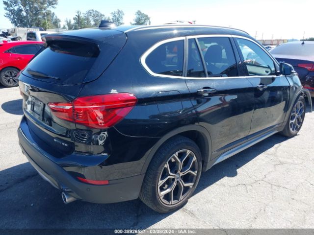 Photo 3 VIN: WBXJG7C04M5T57987 - BMW X1 