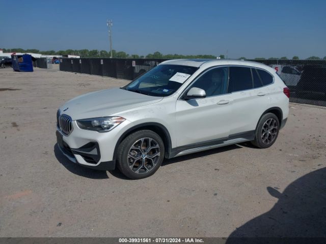 Photo 1 VIN: WBXJG7C04M5T76880 - BMW X1 