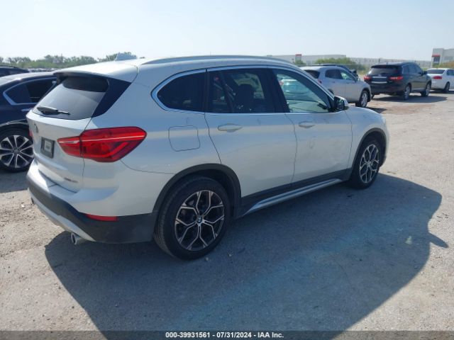 Photo 3 VIN: WBXJG7C04M5T76880 - BMW X1 