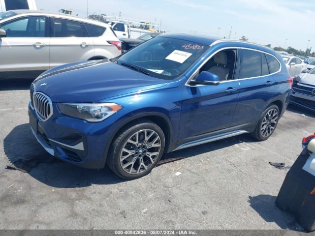 Photo 1 VIN: WBXJG7C05M5U04914 - BMW X1 