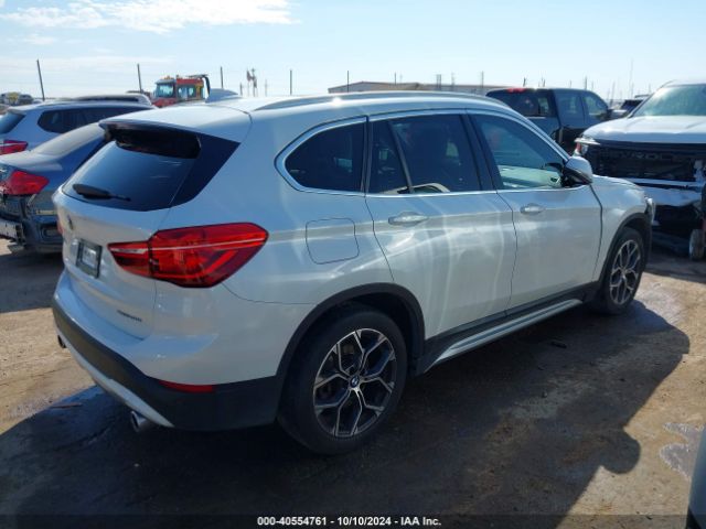 Photo 3 VIN: WBXJG7C06M5T70580 - BMW X1 