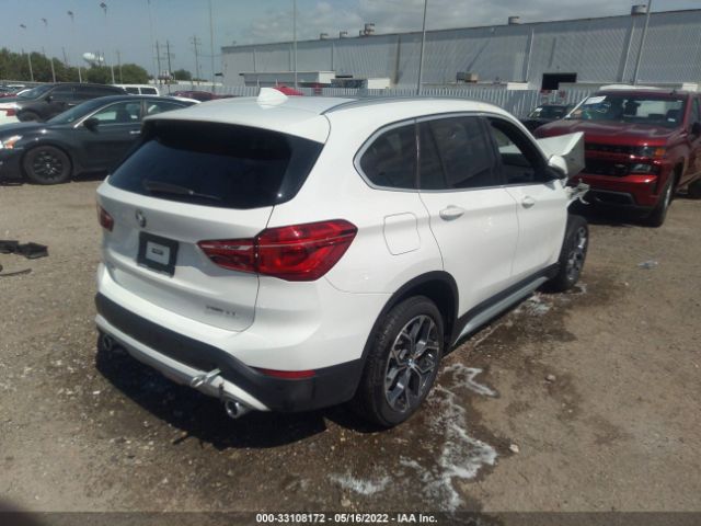 Photo 3 VIN: WBXJG7C06M5U36710 - BMW X1 