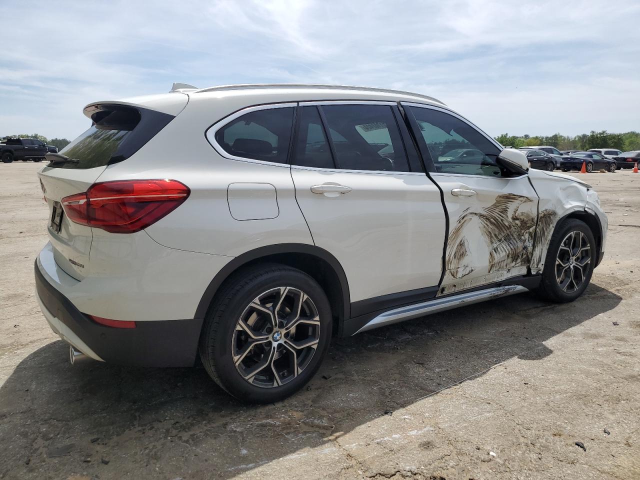 Photo 2 VIN: WBXJG7C07M5S27797 - BMW X1 