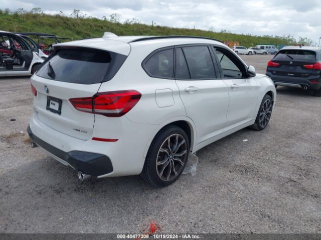 Photo 3 VIN: WBXJG7C07M5S52425 - BMW X1 