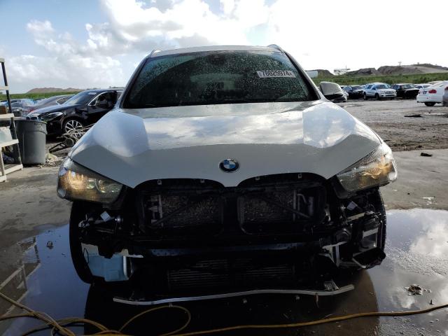 Photo 4 VIN: WBXJG7C08L5P47375 - BMW X1 SDRIVE2 