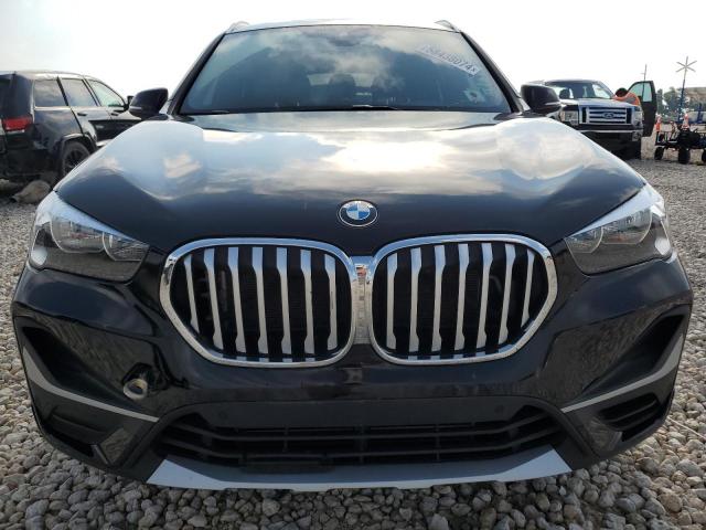 Photo 4 VIN: WBXJG7C08M5U23490 - BMW X1 