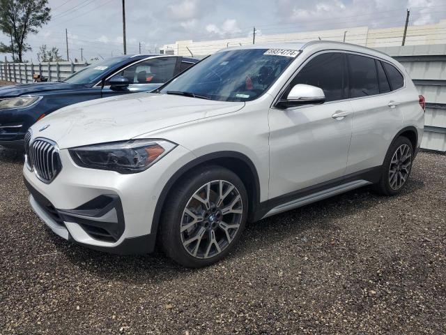 Photo 0 VIN: WBXJG7C09M5T78897 - BMW X1 