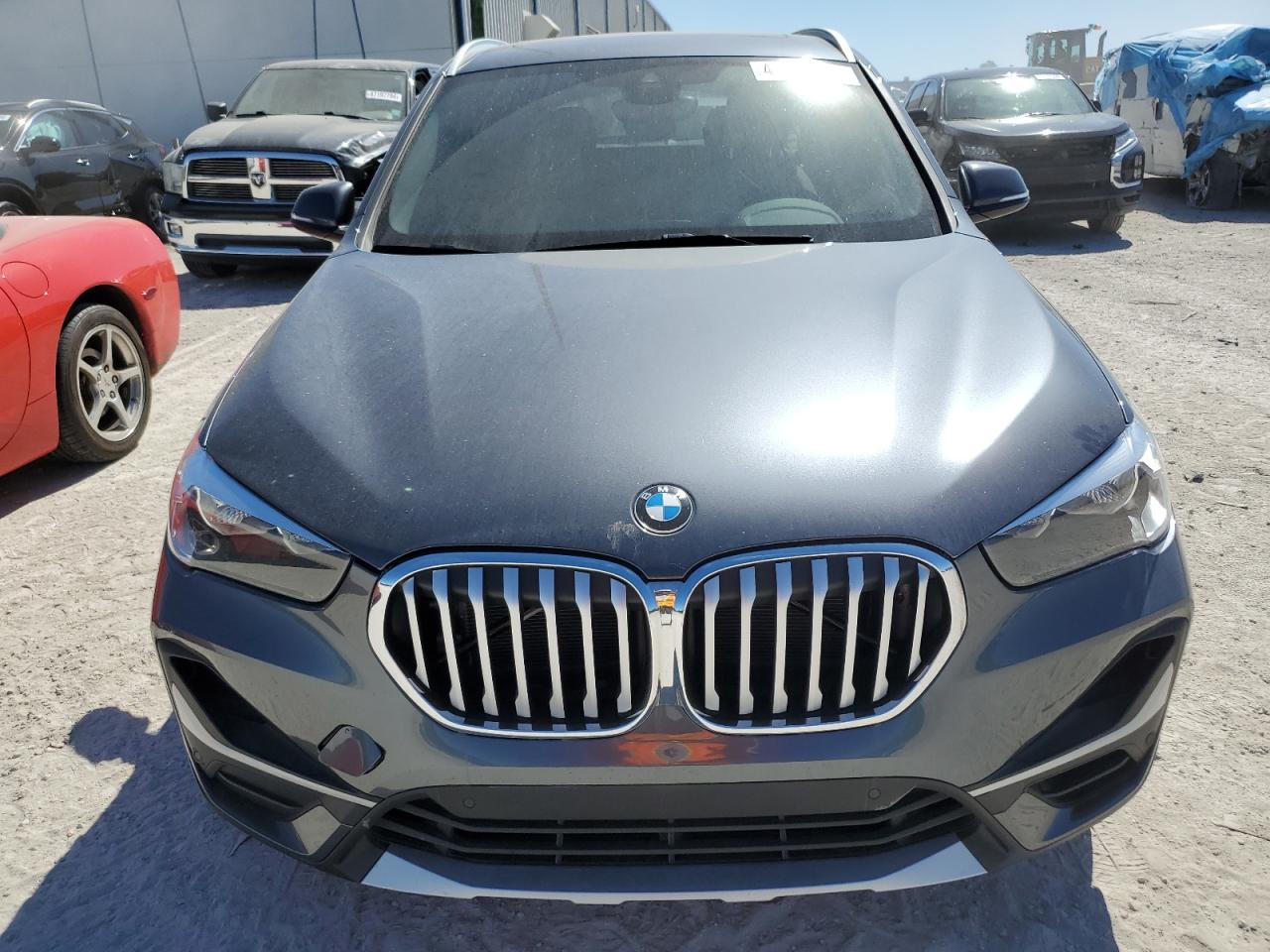 Photo 4 VIN: WBXJG7C0XN5U82784 - BMW X1 