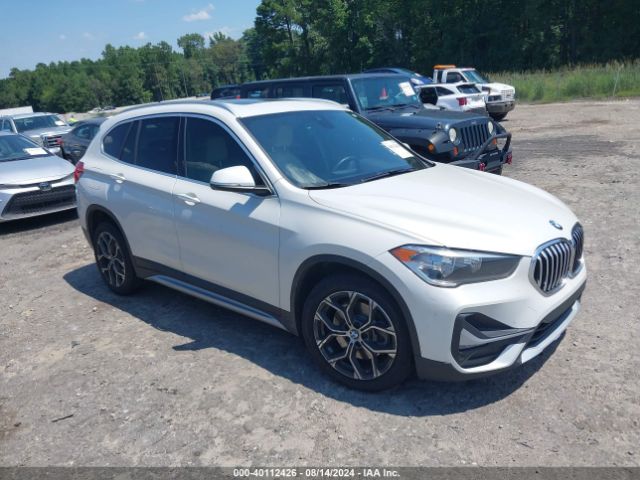 Photo 0 VIN: WBXJG9C04L3L57509 - BMW X1 