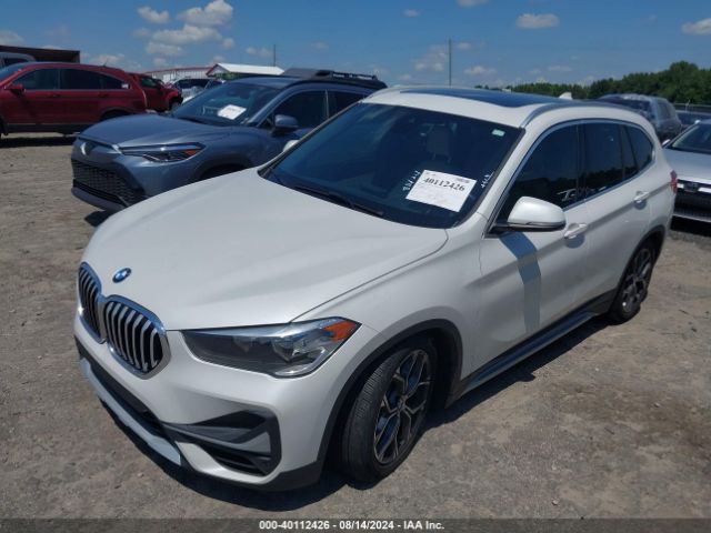 Photo 1 VIN: WBXJG9C04L3L57509 - BMW X1 