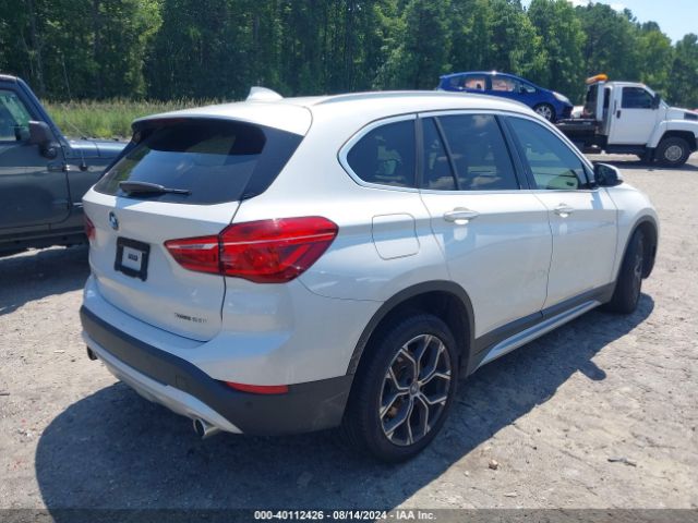 Photo 3 VIN: WBXJG9C04L3L57509 - BMW X1 