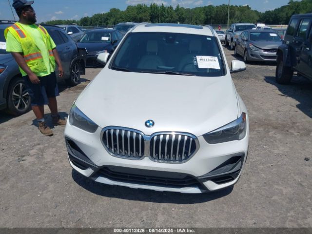 Photo 5 VIN: WBXJG9C04L3L57509 - BMW X1 