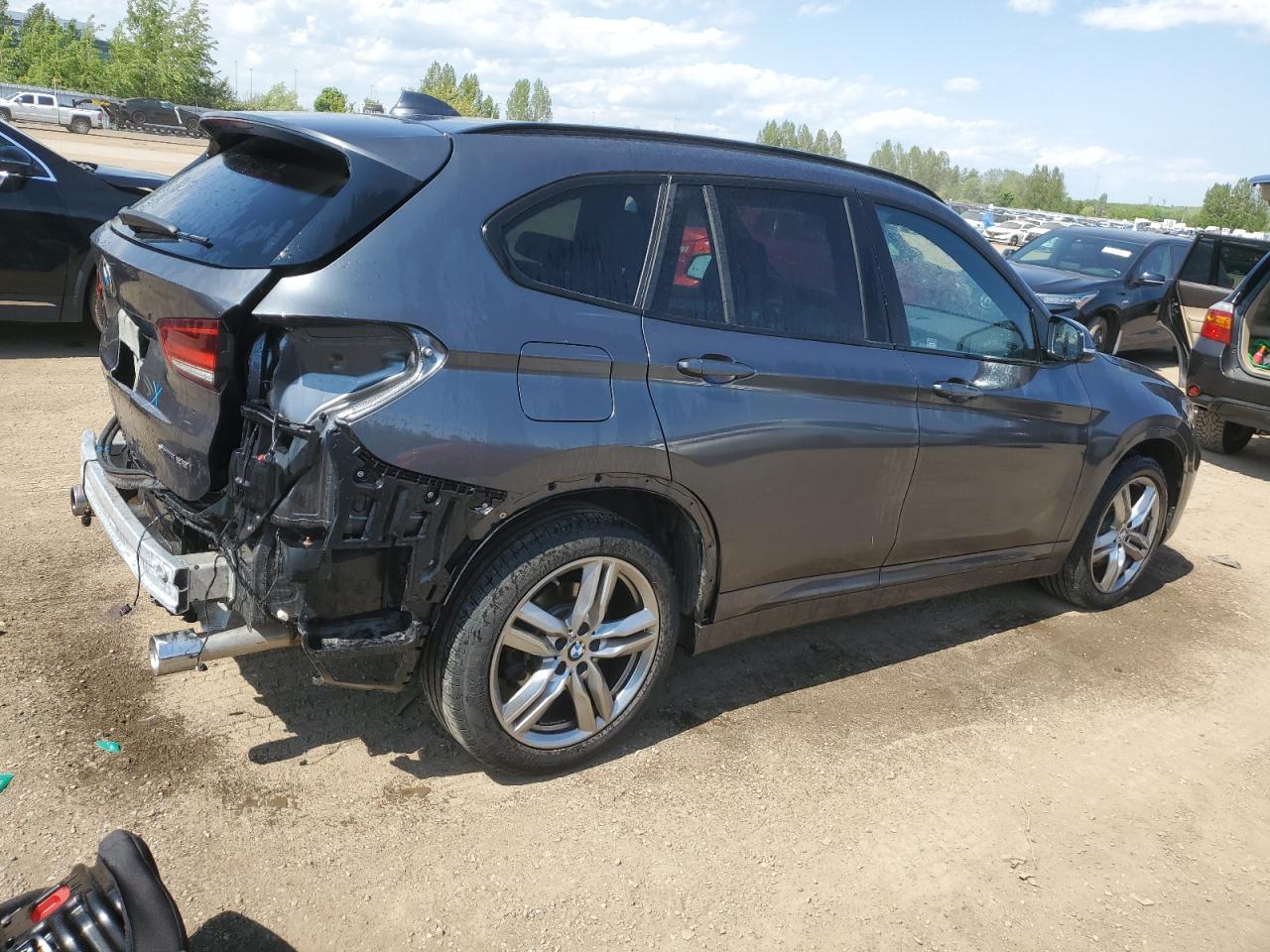 Photo 2 VIN: WBXJG9C04M5T09076 - BMW X1 