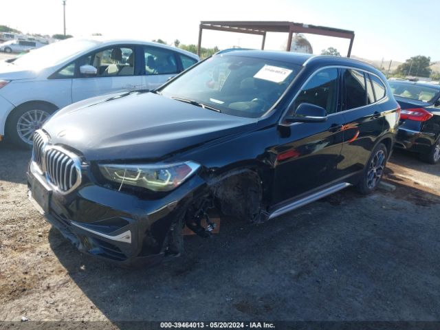 Photo 1 VIN: WBXJG9C04M5T28338 - BMW X1 