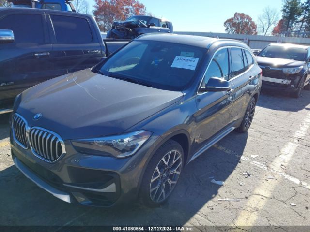 Photo 1 VIN: WBXJG9C06M5T33833 - BMW X1 