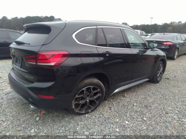 Photo 3 VIN: WBXJG9C06M5T50213 - BMW X1 