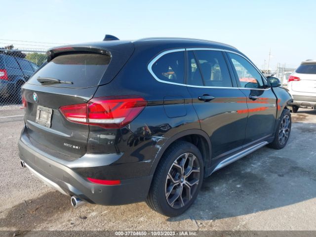 Photo 3 VIN: WBXJG9C08M5S93304 - BMW X1 