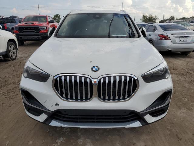 Photo 4 VIN: WBXJG9C0XL5P73634 - BMW X1 XDRIVE2 