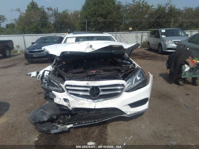 Photo 5 VIN: WDDHF5KBXEA869726 - MERCEDES-BENZ E-CLASS 