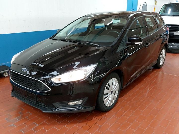 Photo 1 VIN: WF06XXGCC6JY49942 - FORD FOCUS 