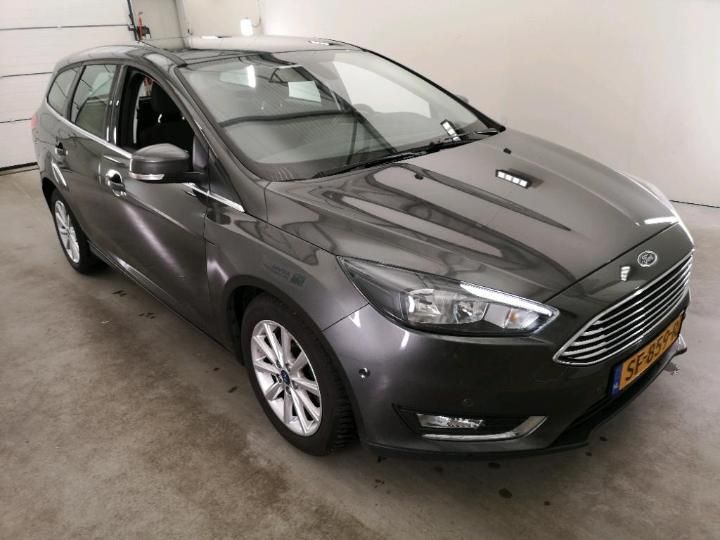 Photo 11 VIN: WF06XXGCC6JY55054 - FORD FOCUS 