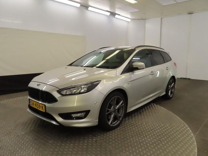 Photo 1 VIN: WF06XXGCC6JY58301 - FORD FOCUS 