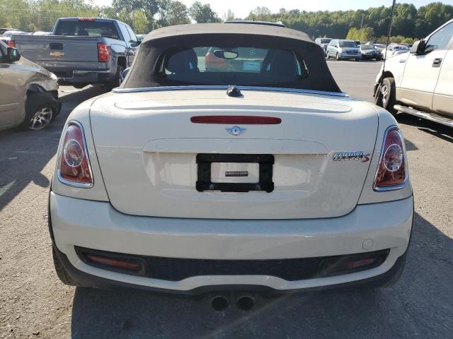 Photo 5 VIN: WMWSY3C58ET566291 - MINI COOPER ROA 