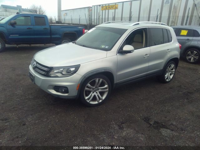 Photo 1 VIN: WVGAV3AX1DW577122 - VOLKSWAGEN TIGUAN 