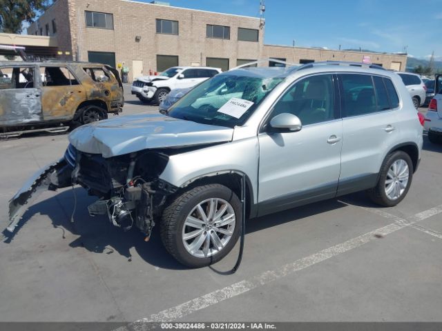 Photo 1 VIN: WVGAV3AX1EW587909 - VOLKSWAGEN TIGUAN 