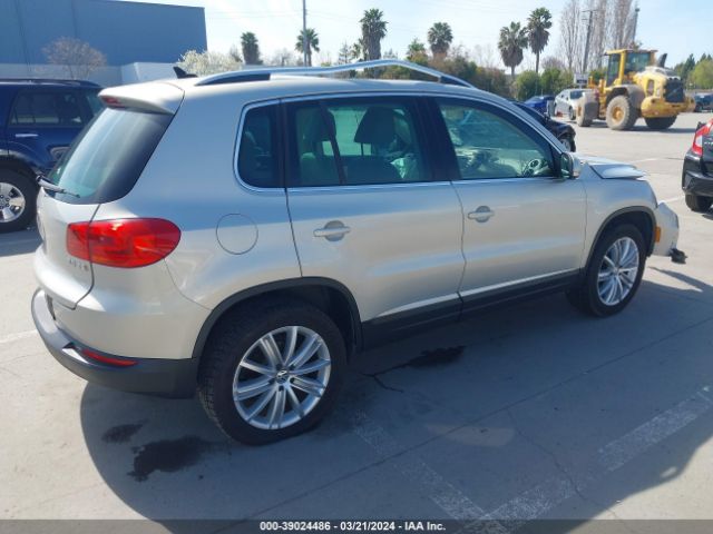 Photo 3 VIN: WVGAV3AX1EW587909 - VOLKSWAGEN TIGUAN 