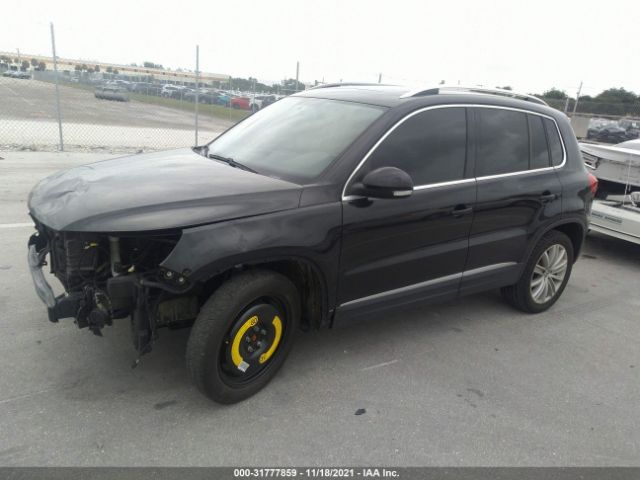 Photo 1 VIN: WVGAV3AX1EW614073 - VOLKSWAGEN TIGUAN 