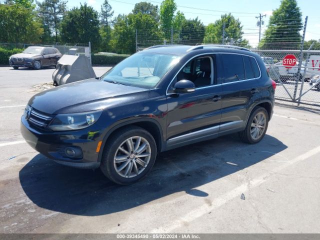 Photo 1 VIN: WVGAV3AX2DW574049 - VOLKSWAGEN TIGUAN 