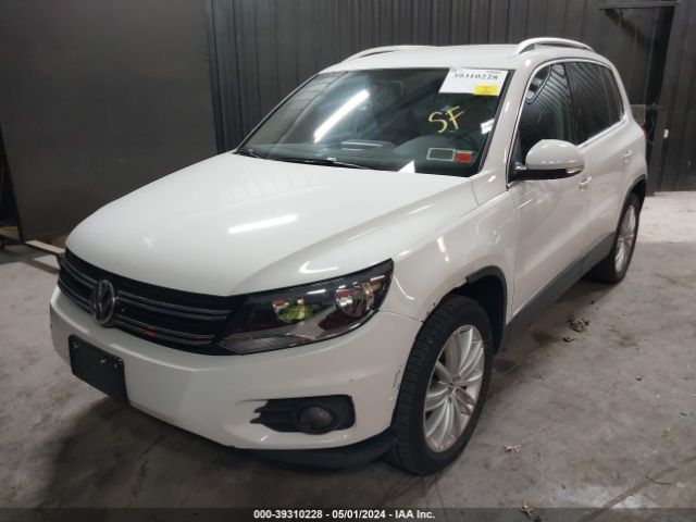 Photo 1 VIN: WVGAV3AX2EW574053 - VOLKSWAGEN TIGUAN 