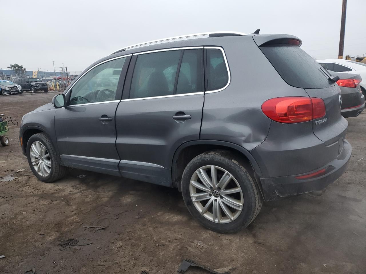 Photo 1 VIN: WVGAV3AX4DW586591 - VOLKSWAGEN TIGUAN 